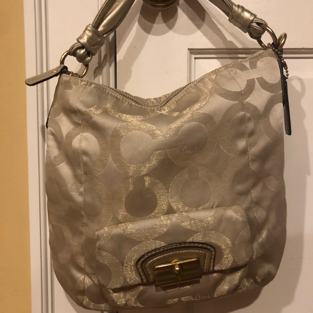 Coach authentic gold colored handbag